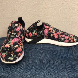 Floral sock shoes.